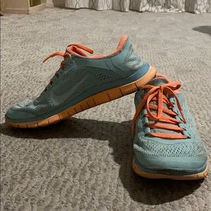 Turquoise and coral color shoes